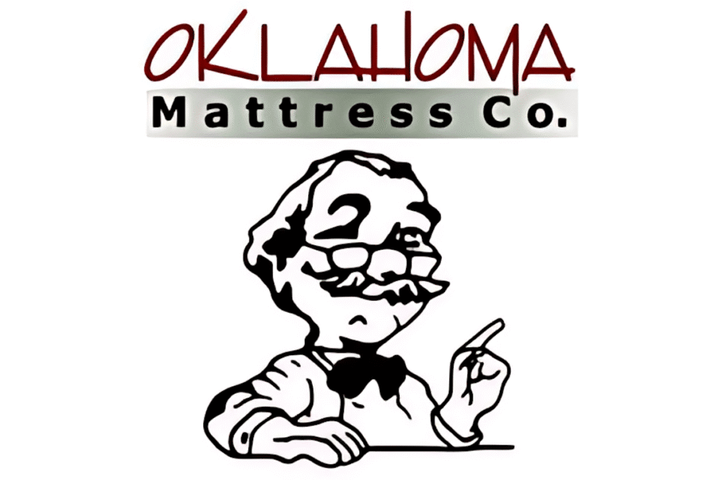Oklahoma Mattress Co logo featuring a cheerful cartoon character with glasses and a bow tie, emphasizing mattress shopping with quality and comfort focus.