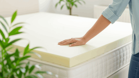 Comfortable mattress with a foam topper on a clean, supportive bed for better sleep quality. High-quality sleep essentials for a restful night and enhanced mattress comfort.