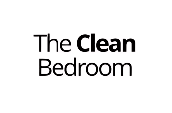 Comfortable, clean bedroom with a focus on healthy sleep environment; featuring a well-made bed and organized space, ideal for mattress shopping and finding the best mattresses for a good night's sleep.